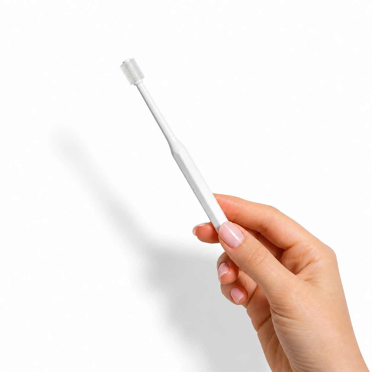 360-degree cat toothbrush with soft high-density bristles designed for gentle and complete dental cleaning