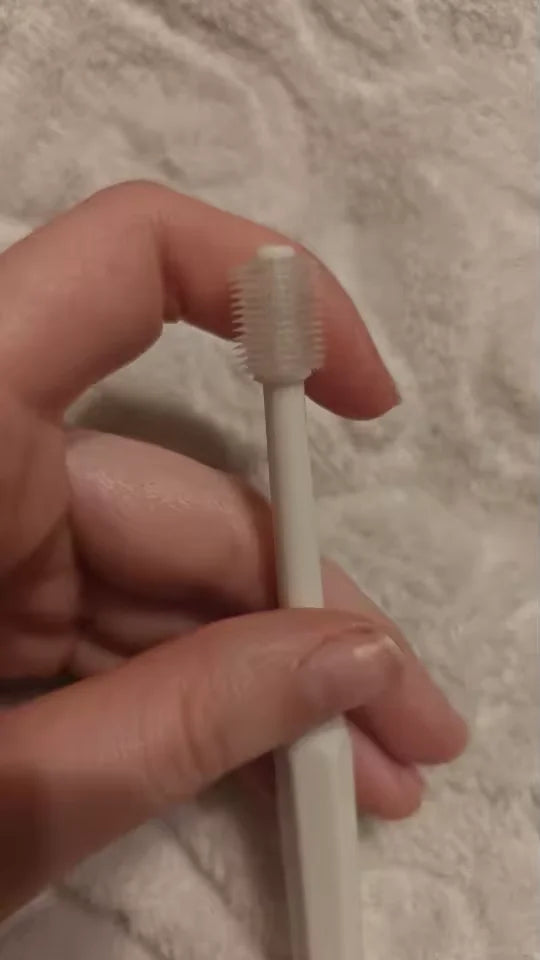Customer showing the RagRoyale 360 ToothBrush after cat dental care