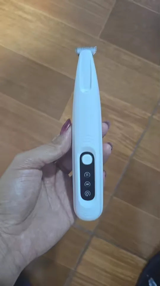 Customer holding the FurTrim in hand before grooming