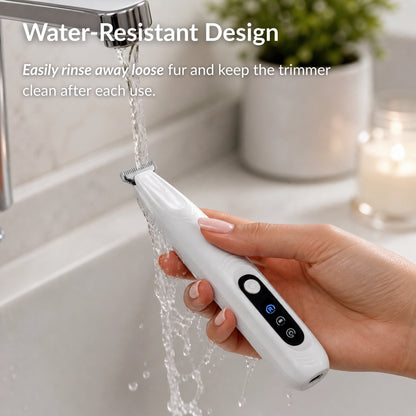 Water-resistant FurTrim cat trimmer being rinsed under running water for quick and easy cleaning after grooming