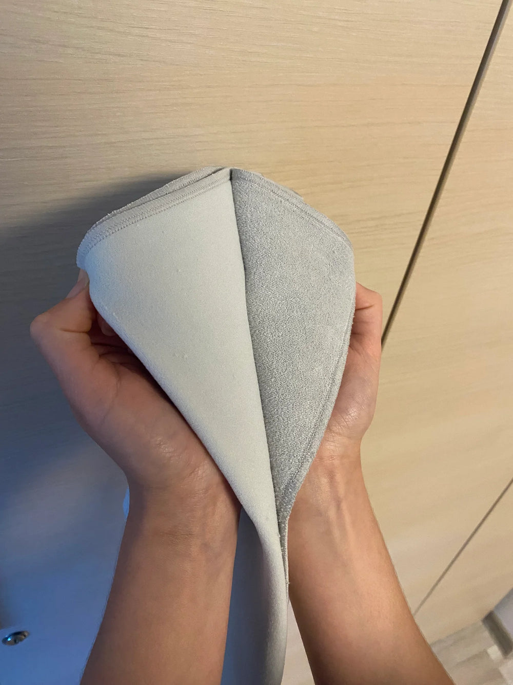 Customer showing the adhesive closure of the RagRoyale GroomWrap