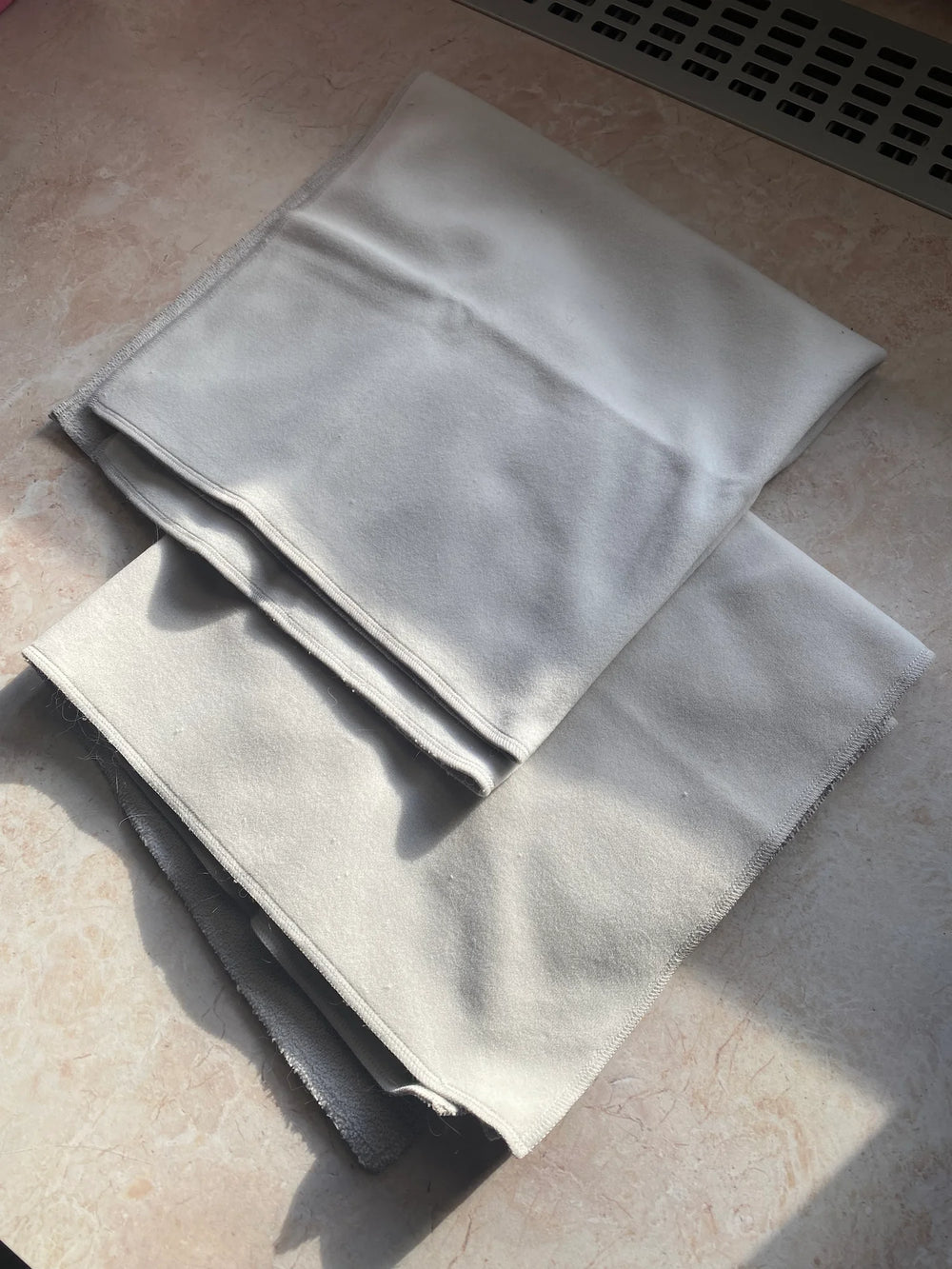 Customer showing the RagRoyale GroomWraps on the table