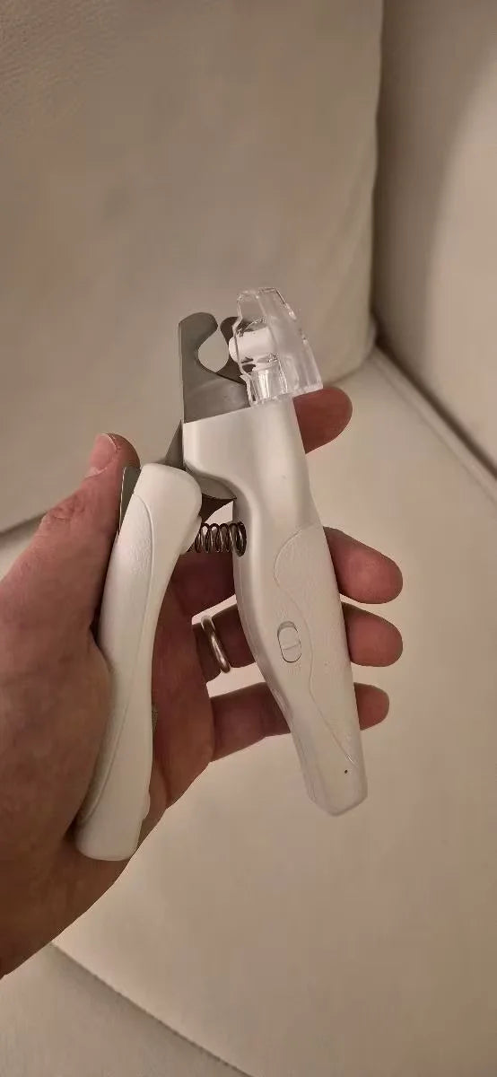 Customer showing RagRoyale LED nail clipper in his hands