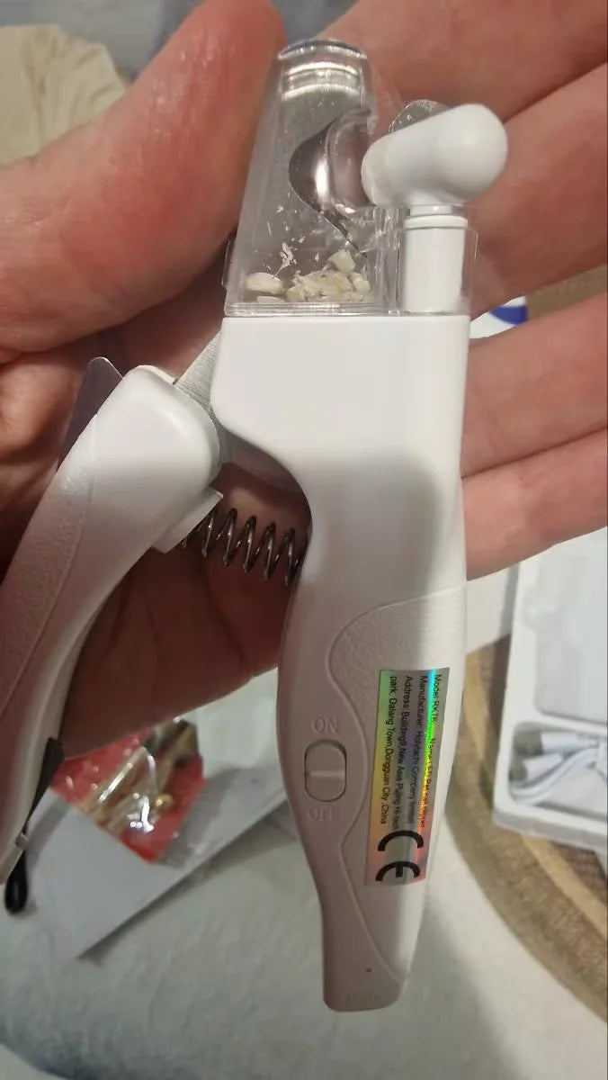 Customer showing nail clipping in the LED nail clipper nail compartment