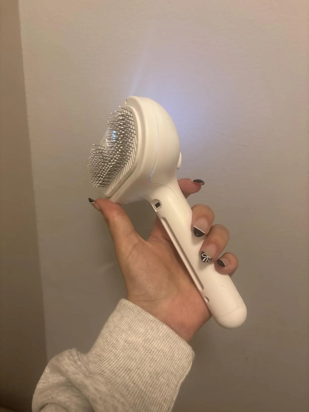 Customer proudly showing her new RagRoyale Mist Brush
