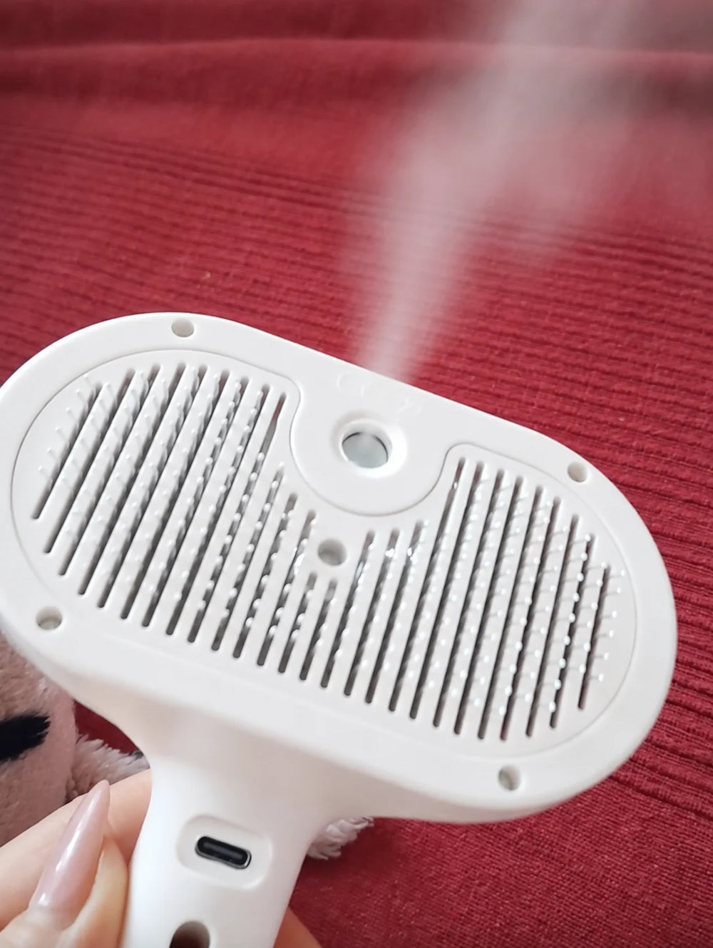 Customer showing the mist coming out of the Mist Brush