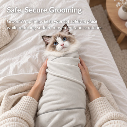Cat comfortably secured in RagRoyale GroomWrap to help prevent scratching, sudden movement and stress during grooming